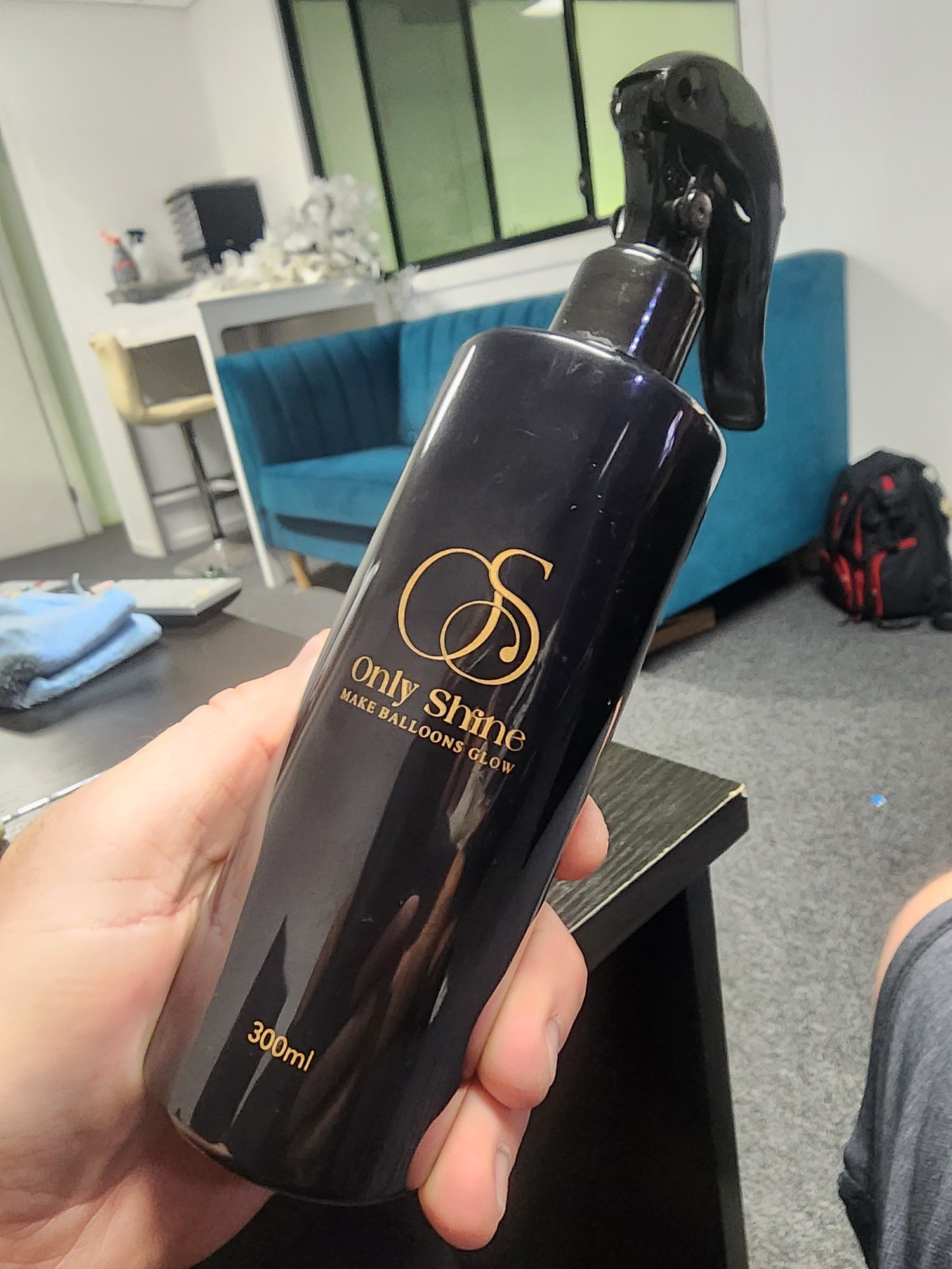 Adam holding the first sample run of the Only Shine bottles